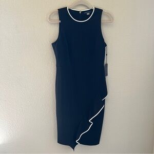 Tommy Hilfiger Black Dress with asymmetrical skirt flare with white trim Size 6